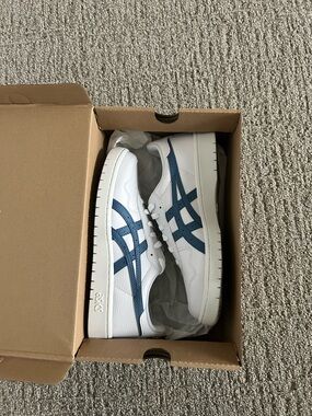 Brand new ASICS White Sneakers with Navy Blue Stripes